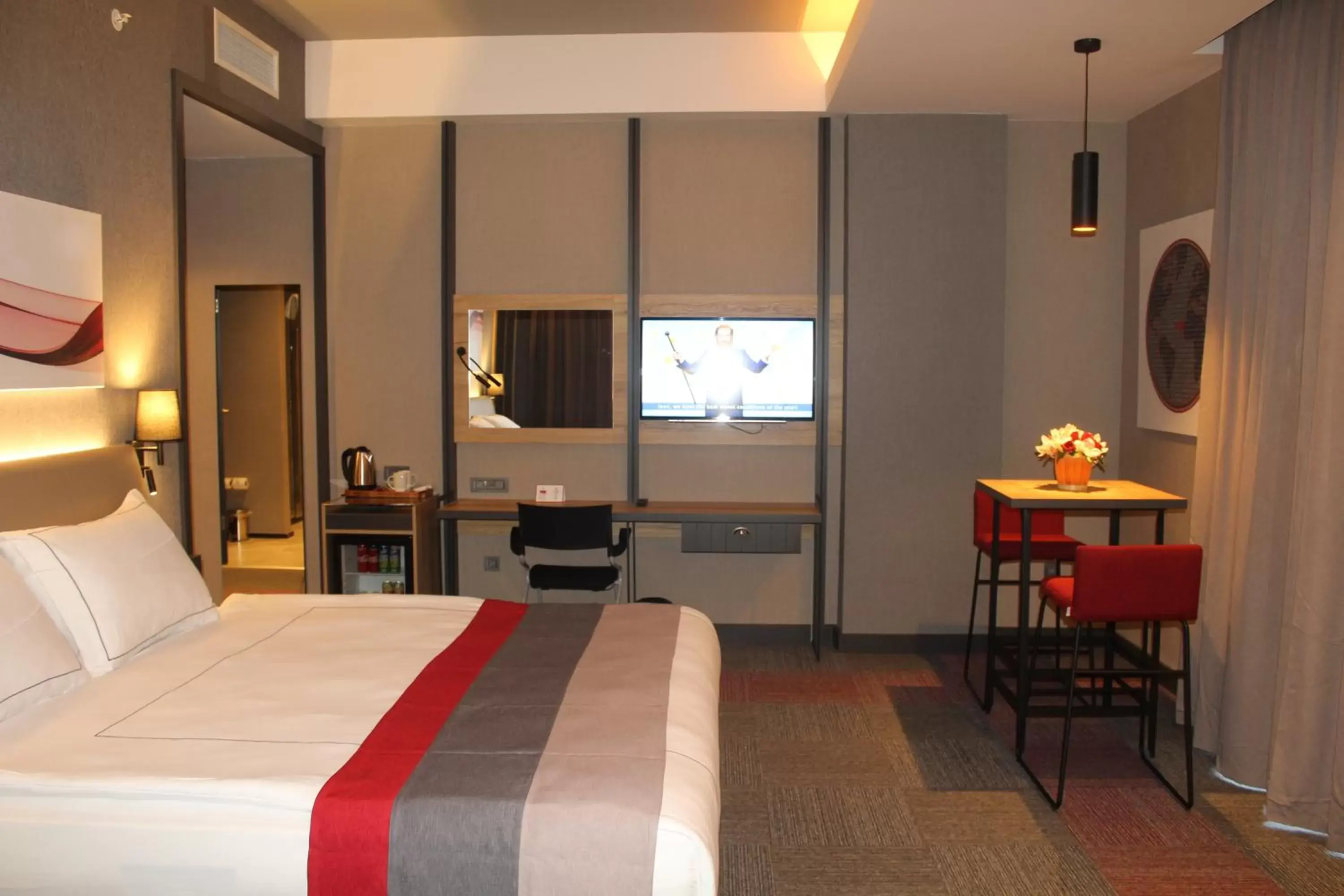 Photo of the whole room in Ramada By Wyndham Tire